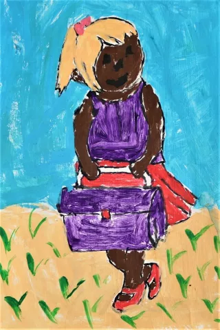 Une petite fille avec son sac d'ecole