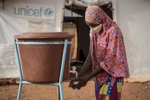 Hawa Gadiaga, 15, who fled her village in 2019 following violence, washes her hands with soap at the Socoura displacement camp in Mopti, central Mali. Displacement sites, where families live in tents in close proximity and often have limited access to quality social services and information, are at high risk of becoming tinderboxes for the spread of COVID-19. As of 23 May 2020, Mopti region had recorded 72 cases of COVID-19. “Hawa’s especially committed to promoting key practices,” says Oumar Gadiaga, a com