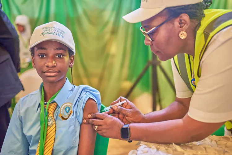 A girl receiving vaccine 
