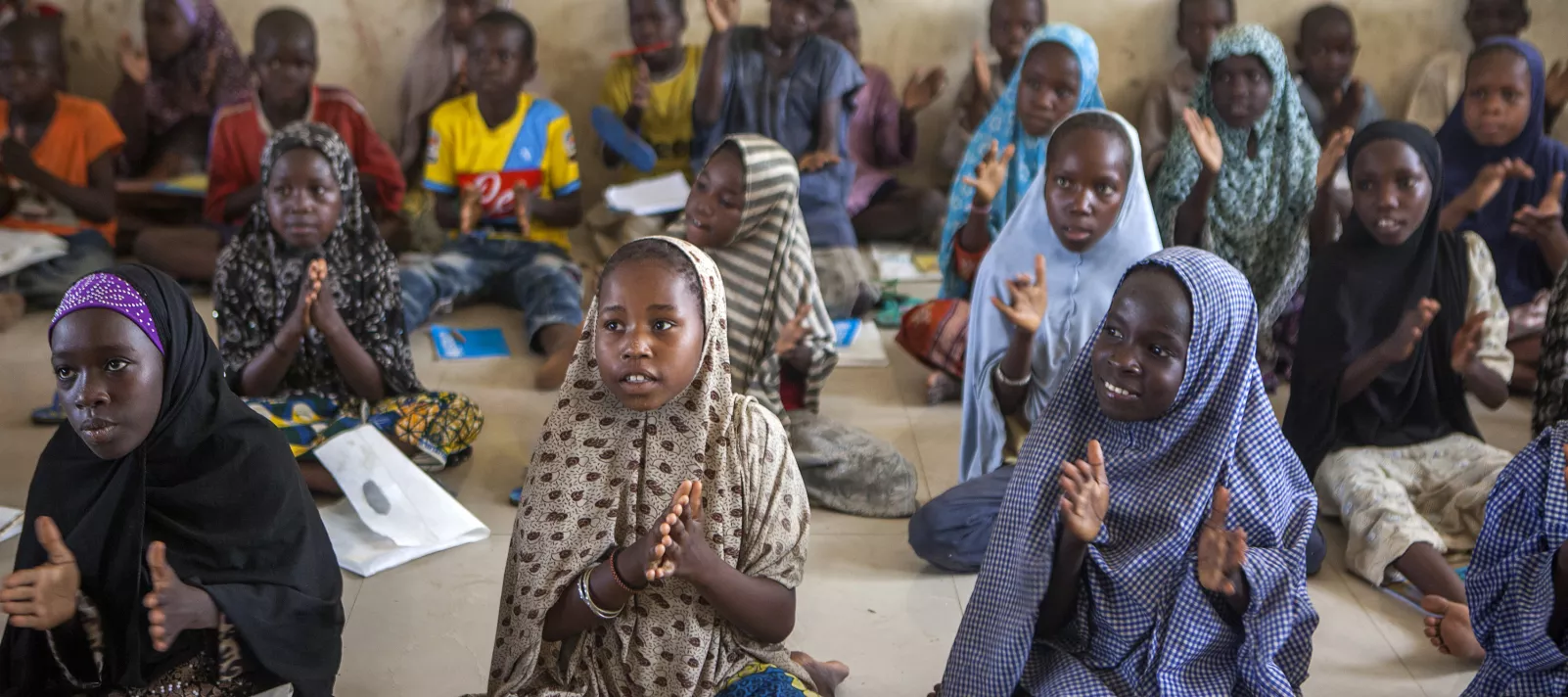 Children at a temporary learning centre in Borno State