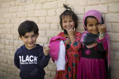 Children pose after getting vaccinated against measles in Chaman District, Balochistan.