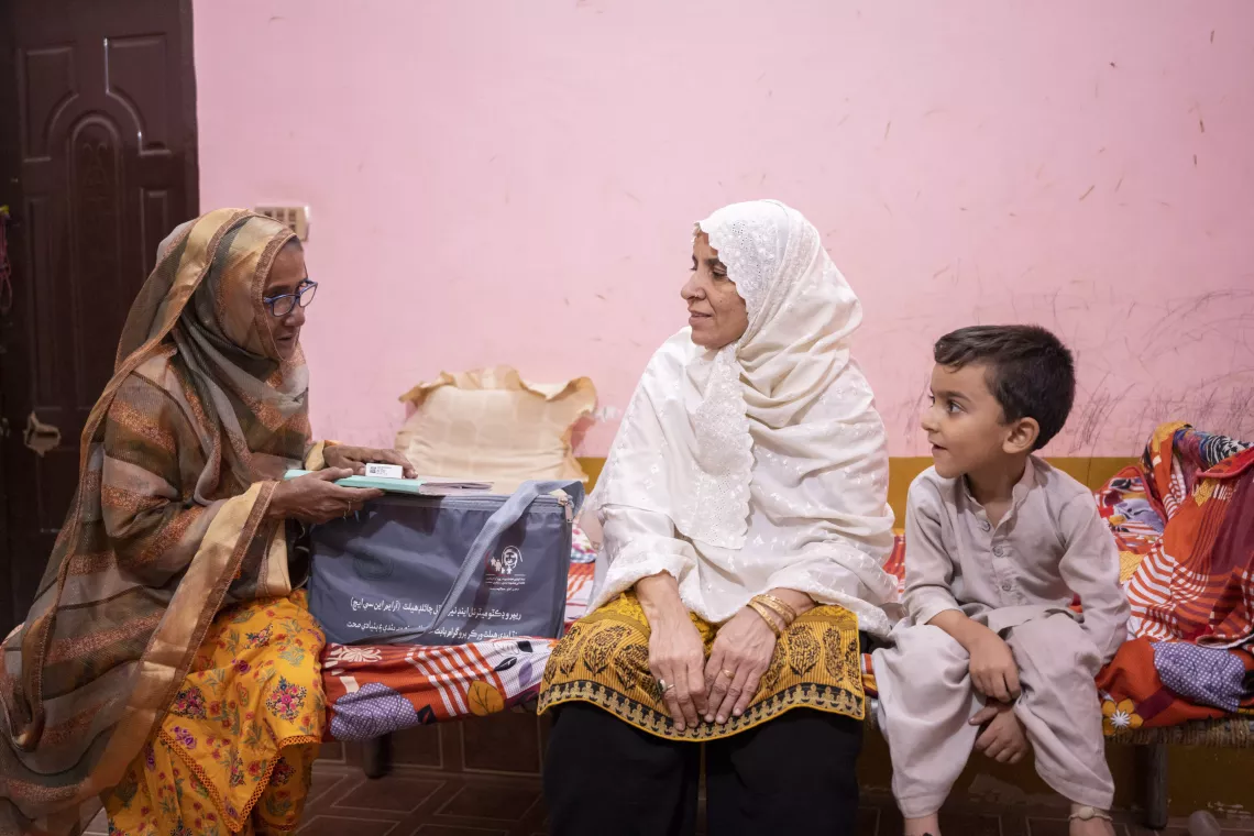 During her daily rounds, Farida follows up on her visit last month with Amna and her son, Hussain (4), who was suffering from intestinal worms.  
