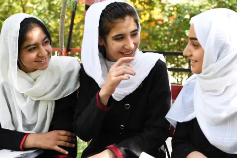 Girls are chatting at the playground in Mehro Girls High School, in Kabul, the capital of Afghanistan.