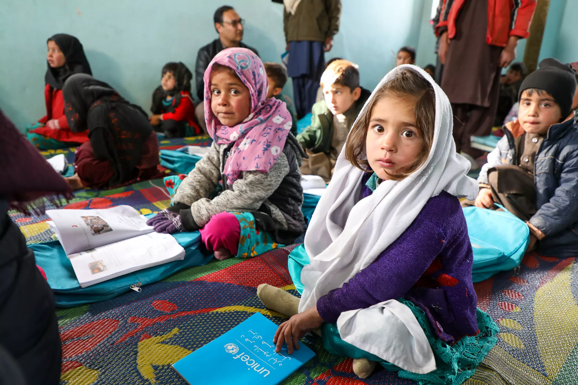 Afghanistan. Children sit studying in a classroom.