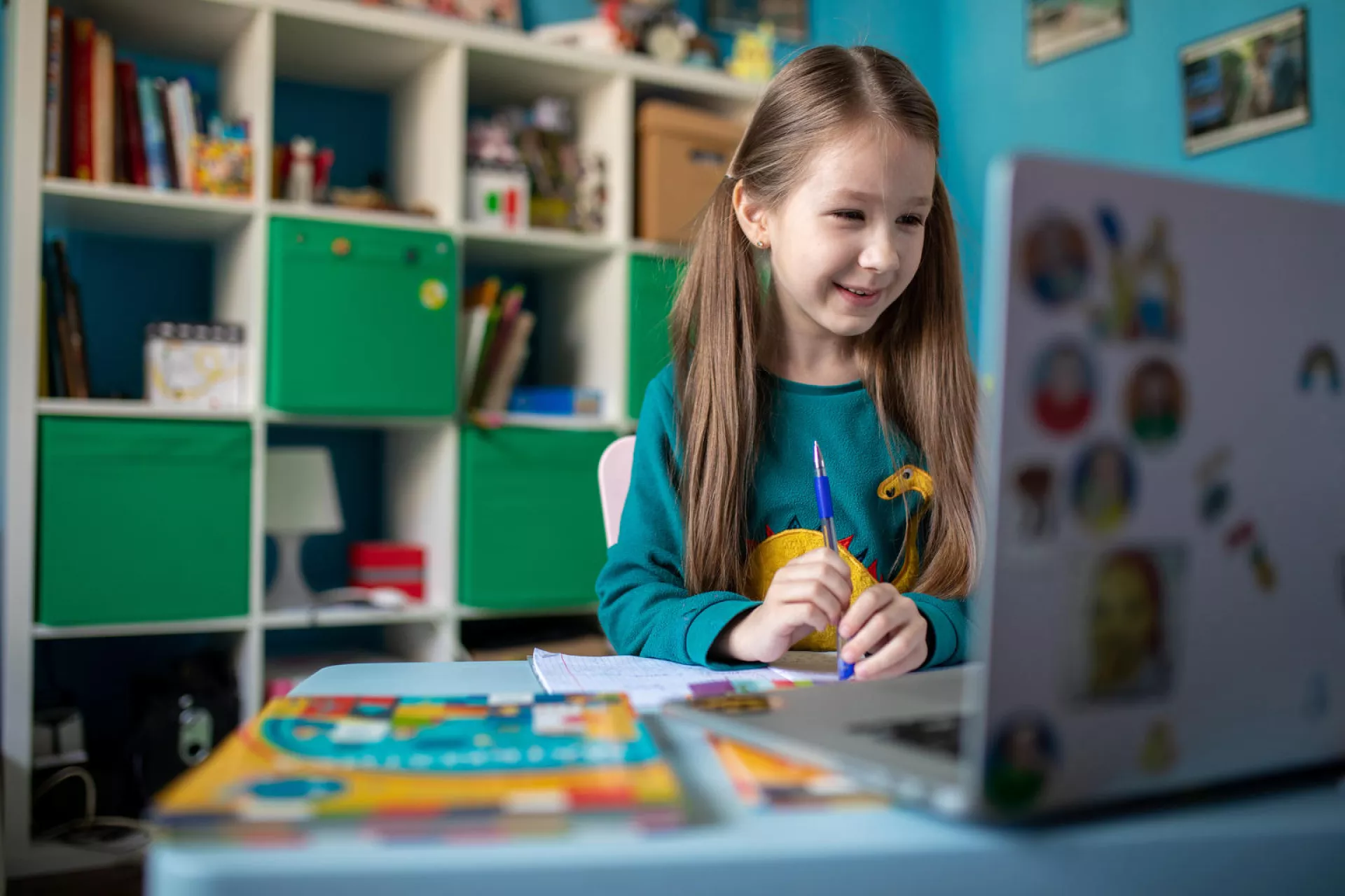 On 15 April 2020 in Kyiv, Ukraine, Zlata, 7, works on schoolwork from home, with all schools in the country closed as part of measures to combat the spread of COVID-19.