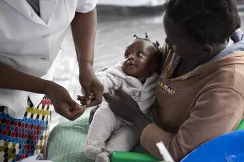 A child in Mozambique is tested for malaria. 