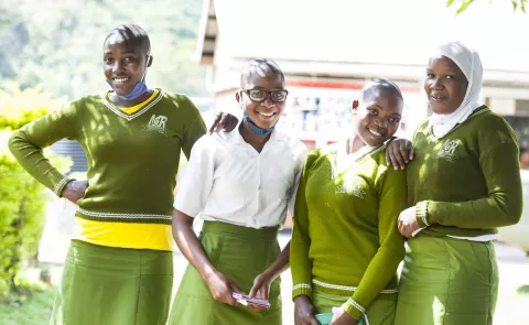 Teenage mothers Mariam Muhindo (extreme right) and Juliet Nyabosi (2nd from right) are supported by their friends Ruth Lhukogho (1st left) and Gloria Kabugho (2nd left).