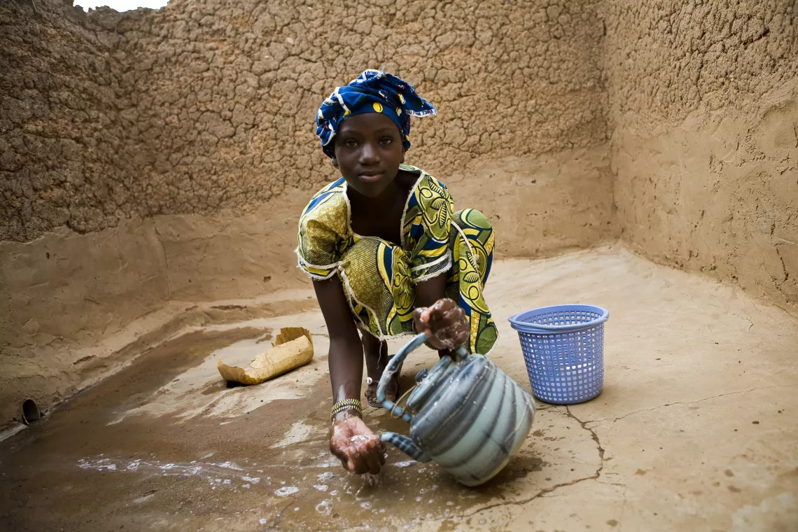 Fatoumata Traore 14 years, is a student who has taught good hygiene practices at school.